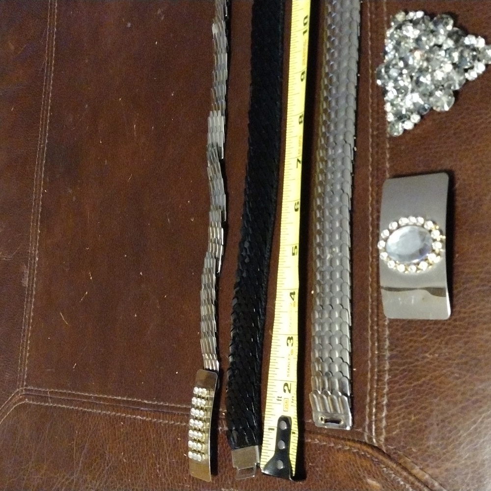 3 belts - 2 buckles